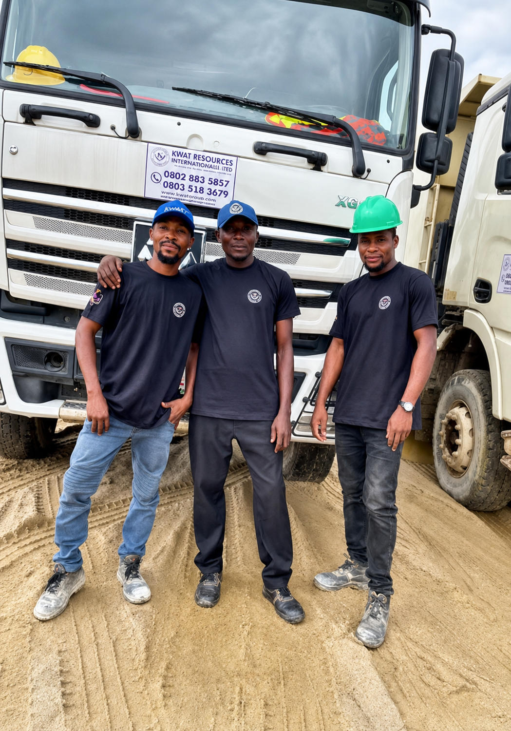 Construction workers with helmets and vests on site